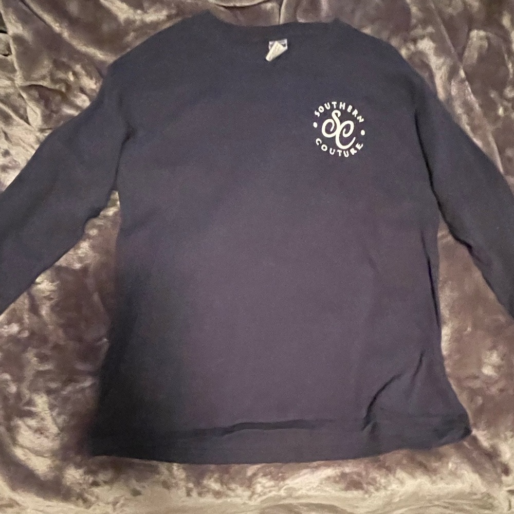 This is a long-sleeved navy blue t shirt thats been worn 1 time.